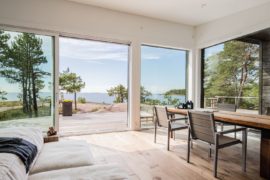 Modern Scandinavian Log Cabin Set on a Beautiful Baltic Sea Island