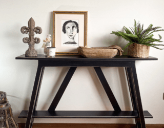 Entrance table covered in decor.